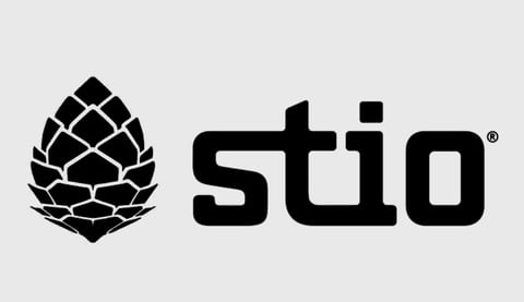 Stio logo featuring a geometric hop cone icon next to bold sans-serif text reading stio