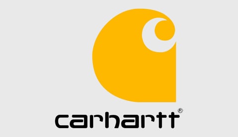 Carhartt logo featuring a yellow and white square design with curved elements above black text