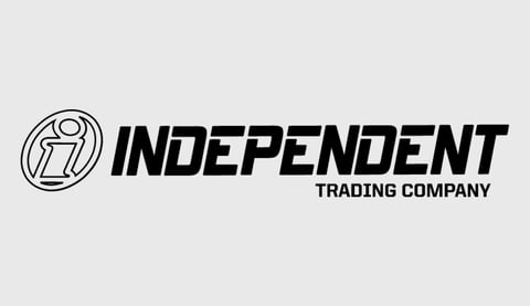 Independent Trading Company logo with circular icon and black text on light background